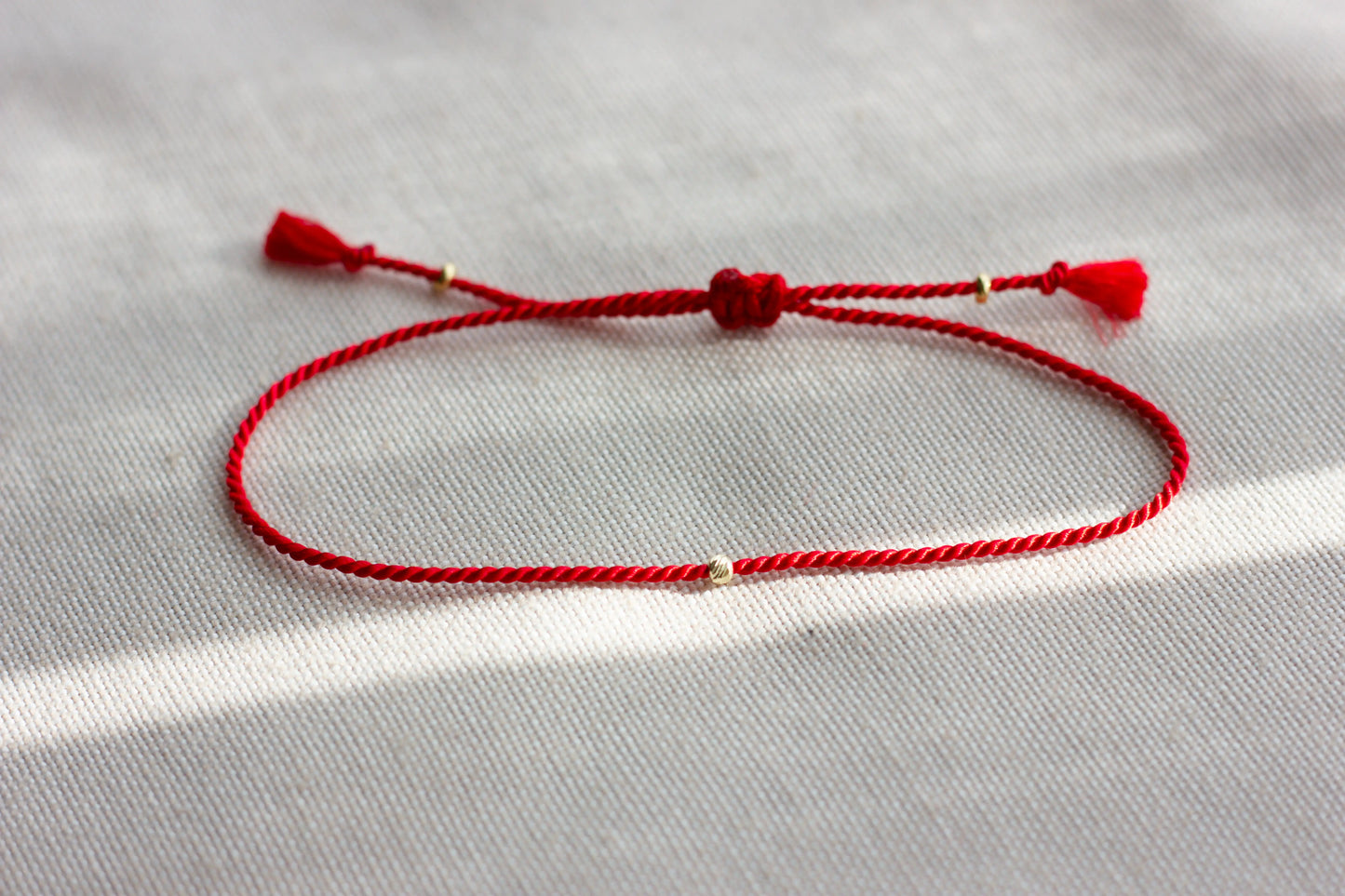 Minimalist Red String Bracelet with Gold Bead
