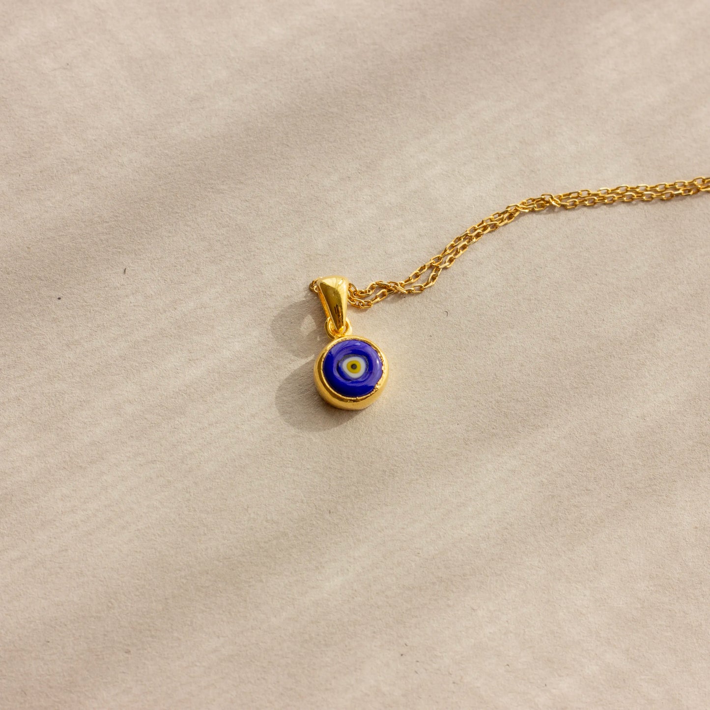 Tiny blue evil eye necklace