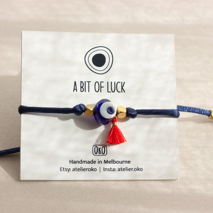 evil eye protection with red tassel for good luck