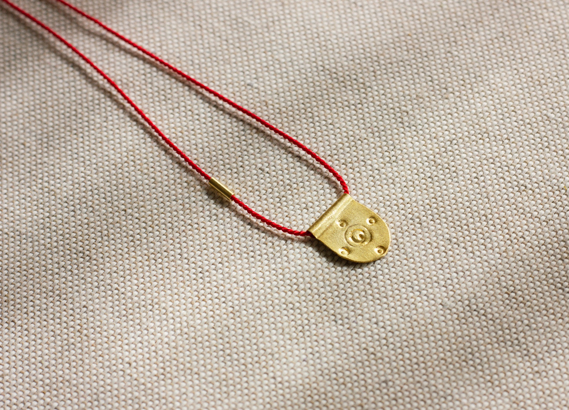 Harmony of the Spheres talisman necklace – handcrafted 24K gold-plated silver pendant on natural silk cord'