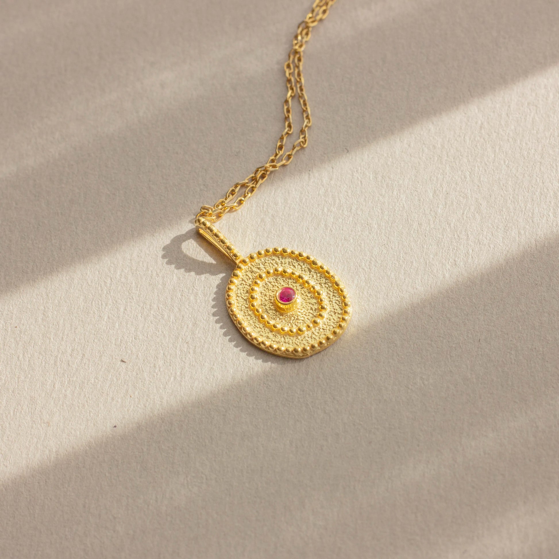 Pink eye charm 