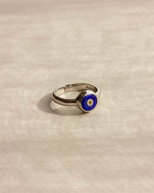 Adjustable 925 sterling silver blue evil eye ring.