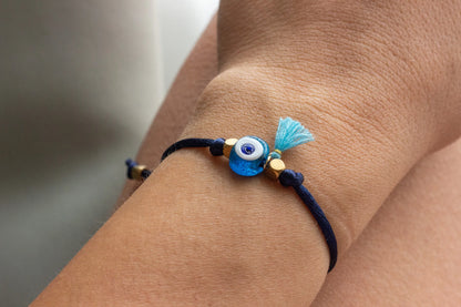 Bracelet with a blue evil eye charm