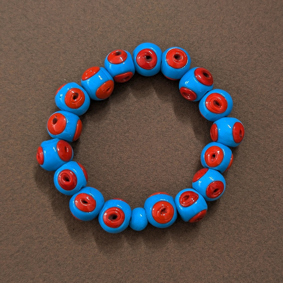 turquise and red evil eye bracelet for protection